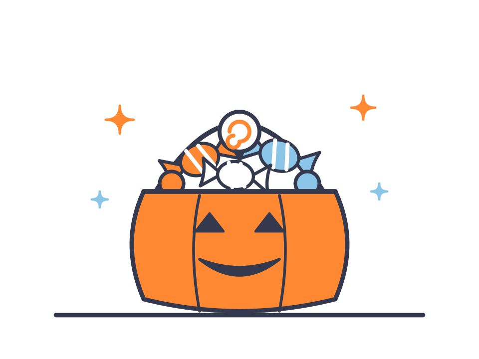 A pumpkin bucket full of candy